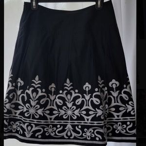 INC blank and white embroidered skirt